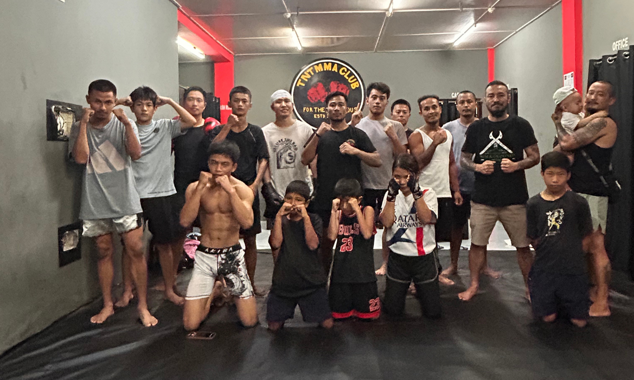 Behind the Build (TNT Combat Lab): What It Really Takes to Create Something From Nothing 3 A group picture from the old TNT gym hall